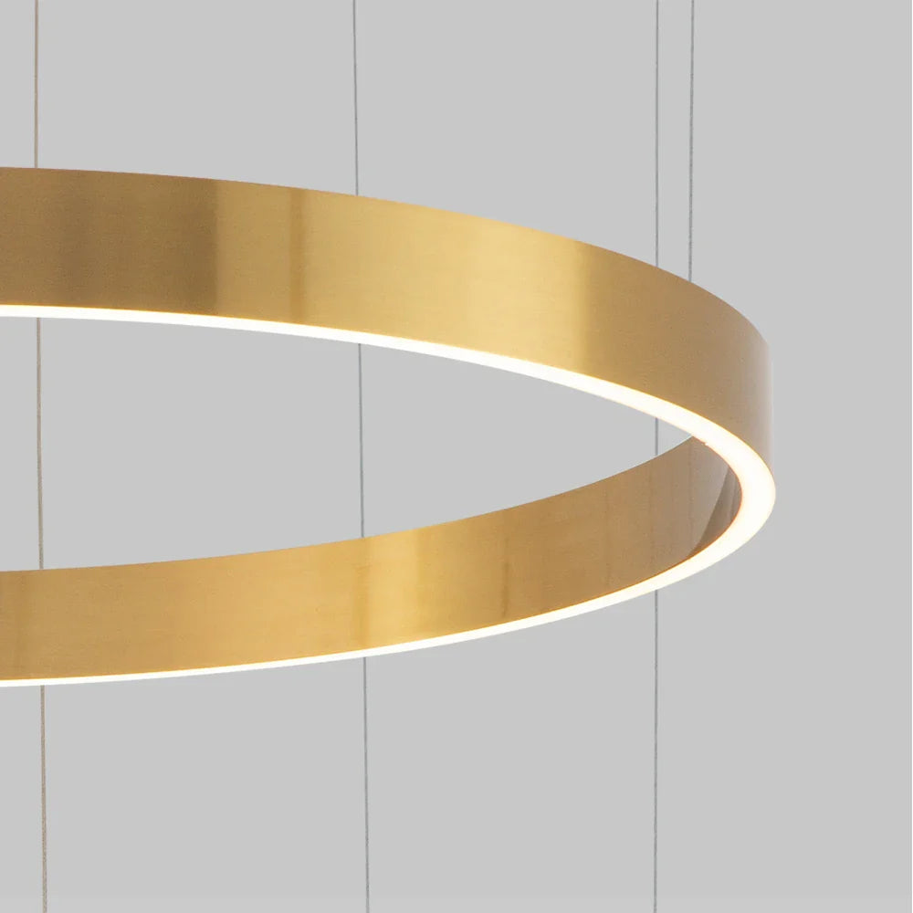 Close up of illuminated circular ring form on the Jobson Trio Circular Chandelier