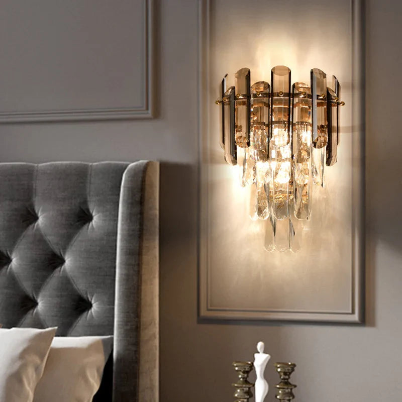 Lugano Wall Light with oblong crystals illuminating a luxury bedroom interior