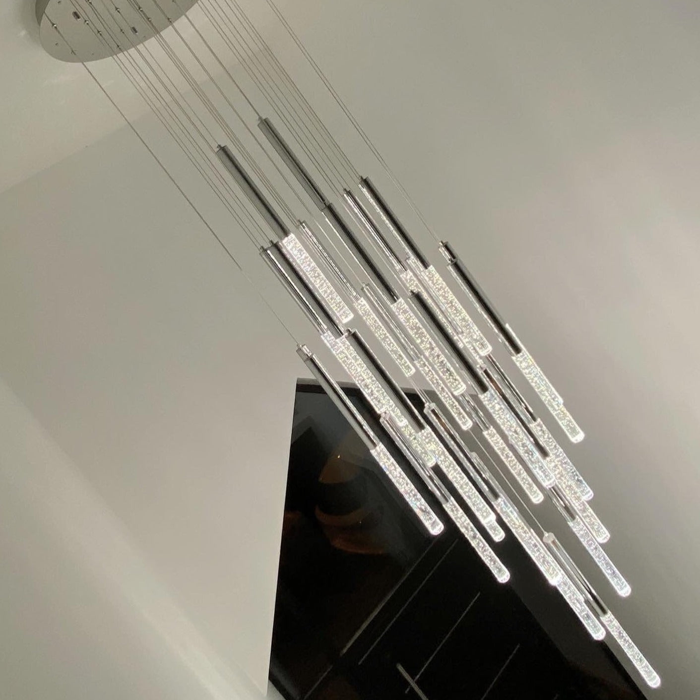 Long double height crystal chandelier for UAE stairwell