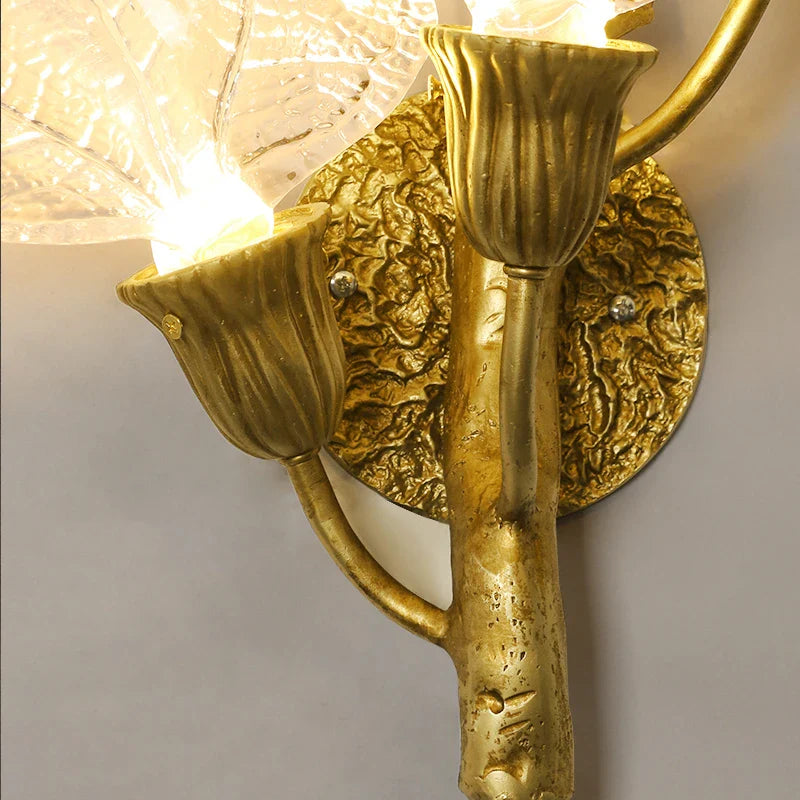 Sculptural wall mount and illuminated glass leaves of the Ottobre wall light