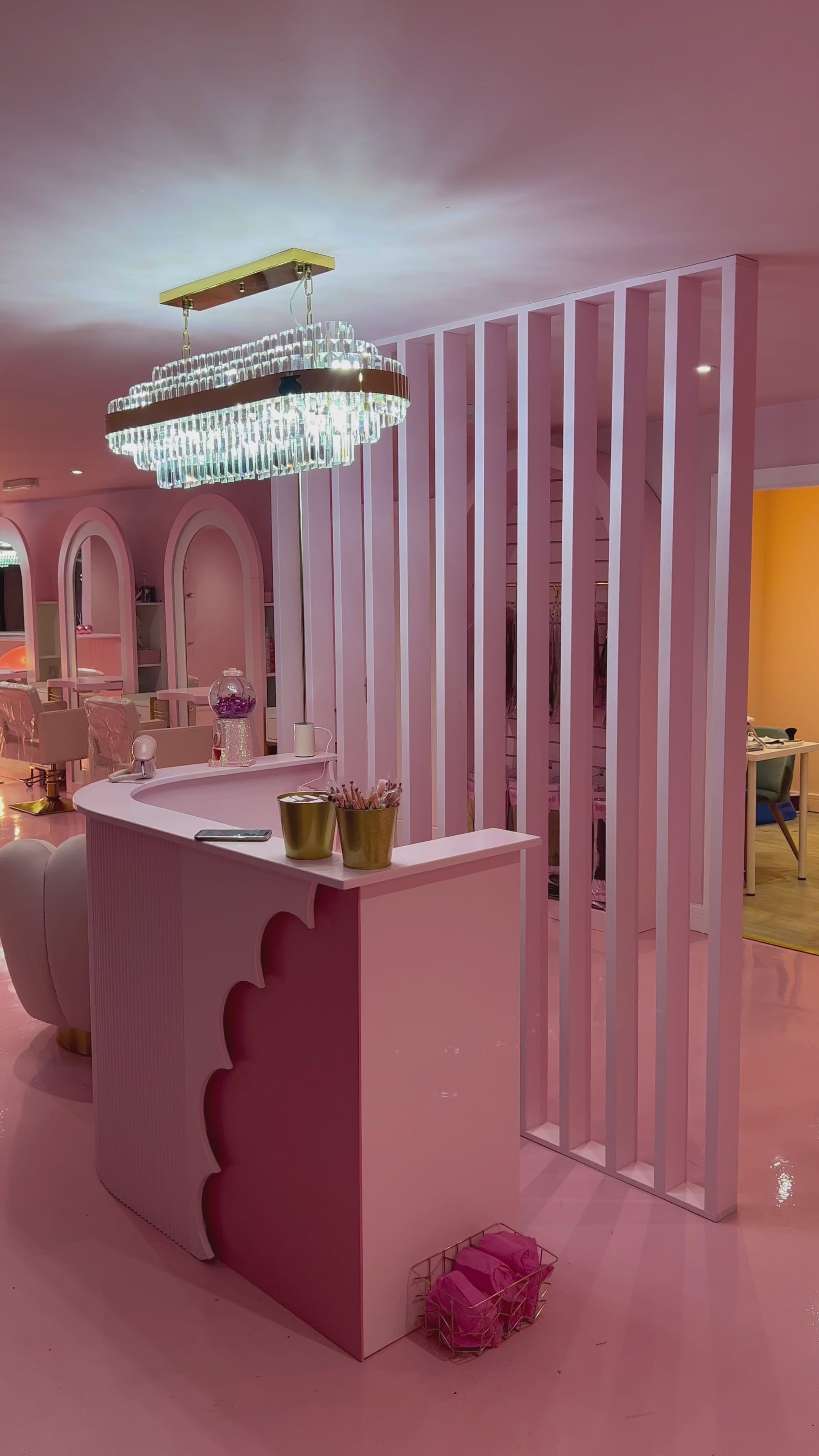 Side view of the Belair rectangular chandelier showcasing tiered crystal bars.
