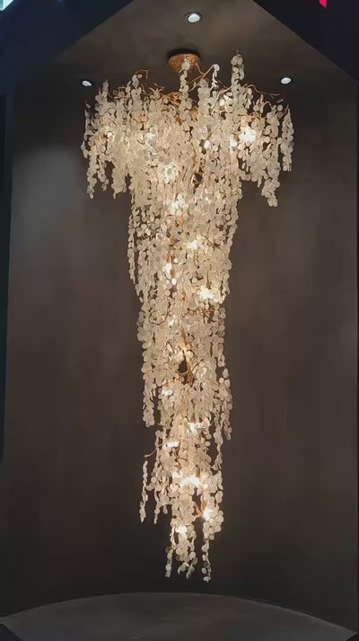 Lunaria Linear Staircase Chandelier video by VORELLI® showing staircase chandelier scale for Dubai villas and UAE palace interiors