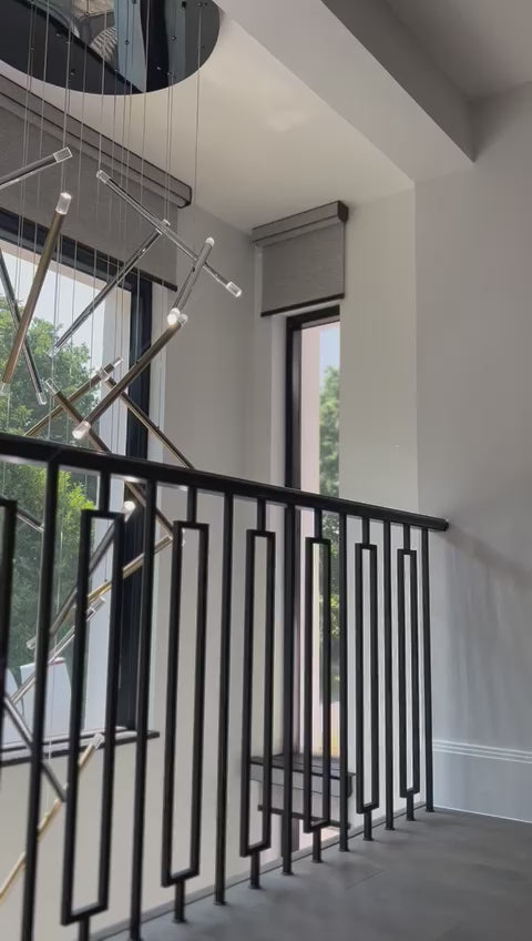Linear Rizzano stairwell lighting creating a refined focal point in a luxury residential space
