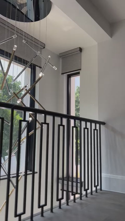 Linear Rizzano stairwell lighting creating a refined focal point in a luxury residential space