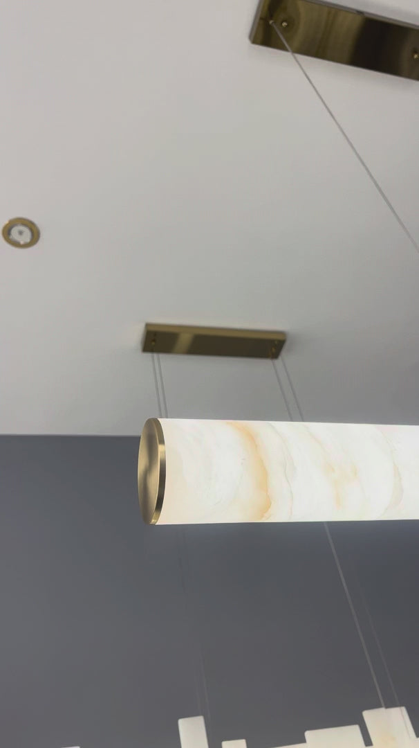 Avora Marble Rectangular Chandelier video by VORELLI® showing rectangular chandelier proportion for Dubai dining rooms and UAE villas