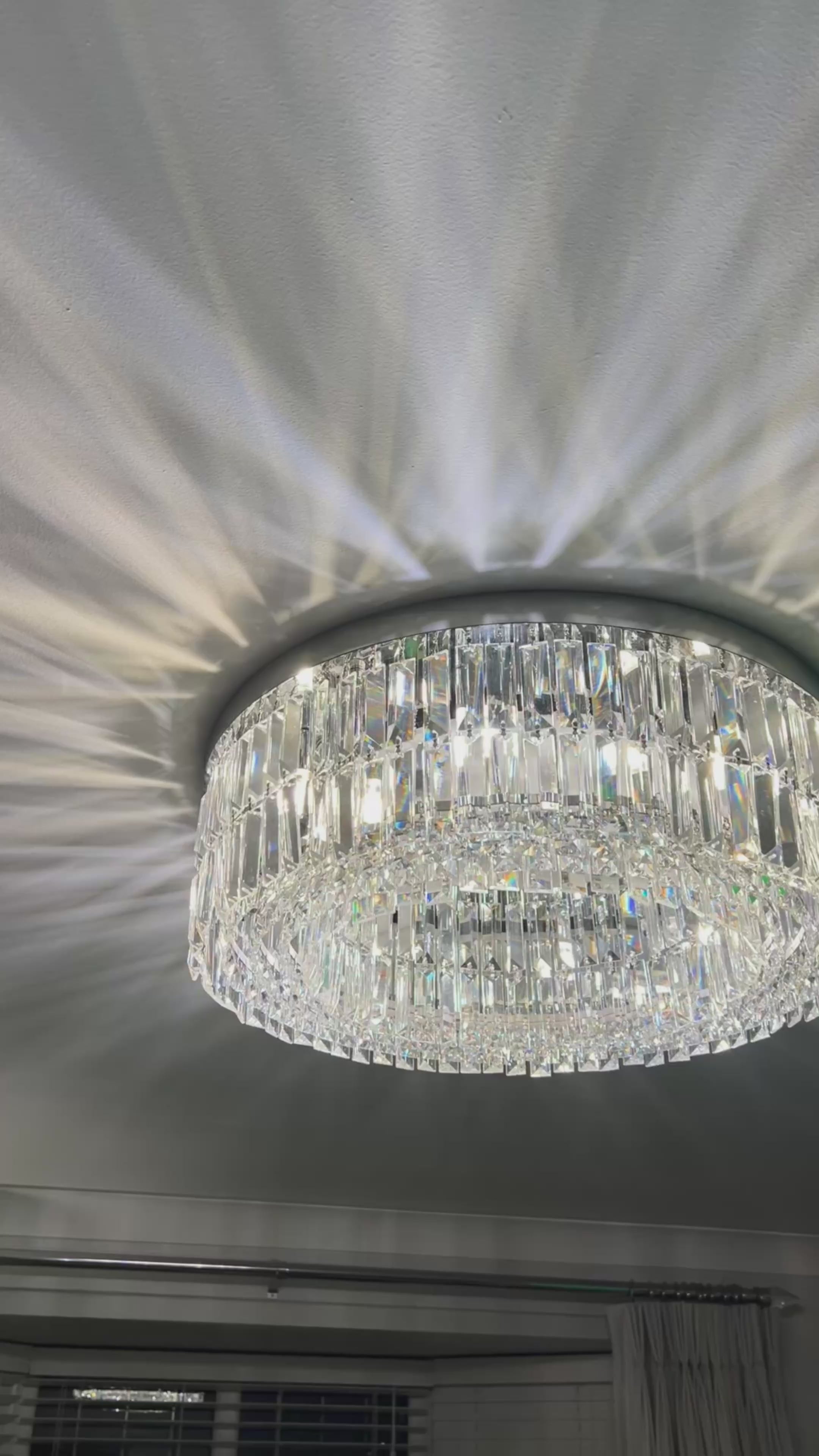 Modern ceiling light delivering a soft ambient glow across a sophisticated living room