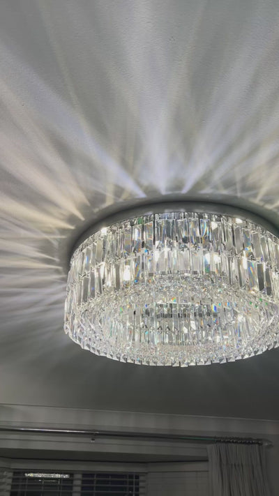 Modern ceiling light delivering a soft ambient glow across a sophisticated living room