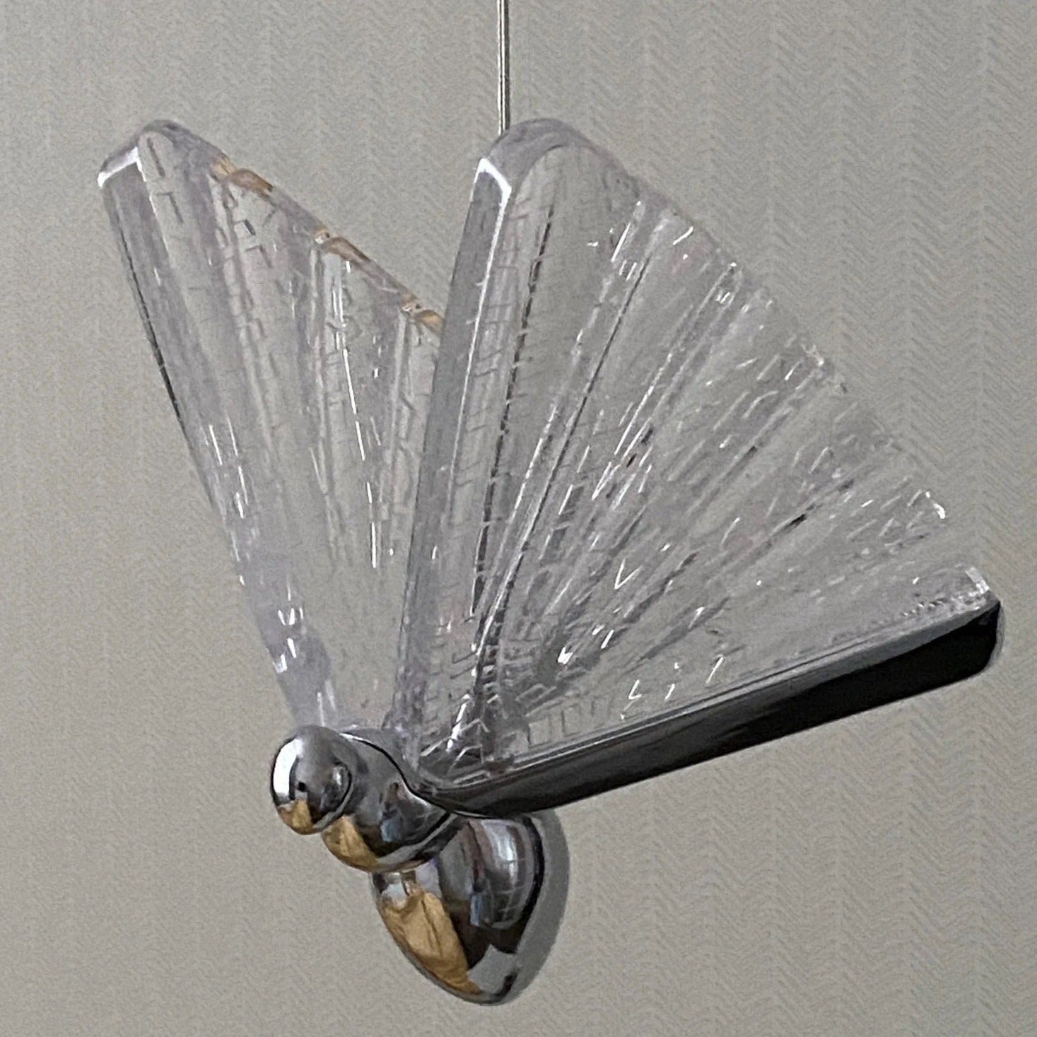 Cluster arrangement of Butterfly Pendant Lights suspended at varied heights, creating a magical floating effect.