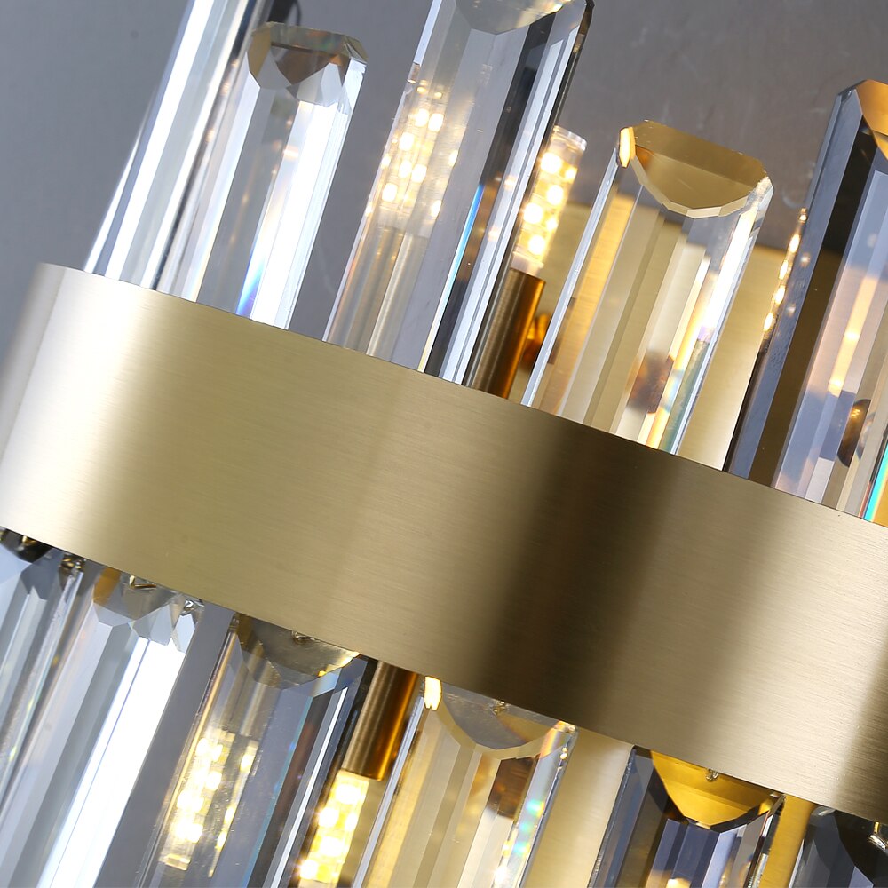 Close up of clear and smoky grey diamond cut crystals on wall light