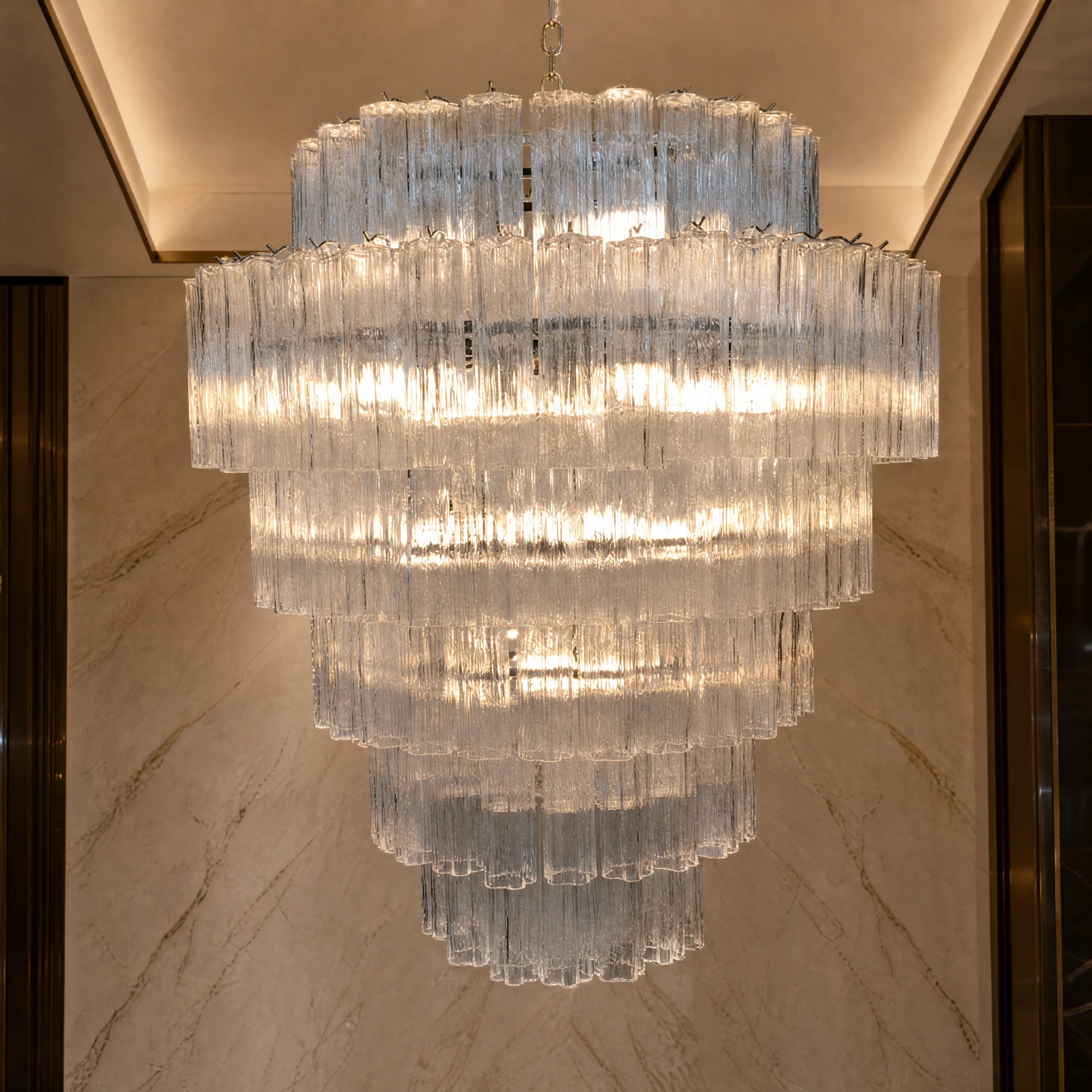 Francesca Tronchi Murano Glass Staircase Chandelier close-up luxury lifestyle hero image by VORELLI