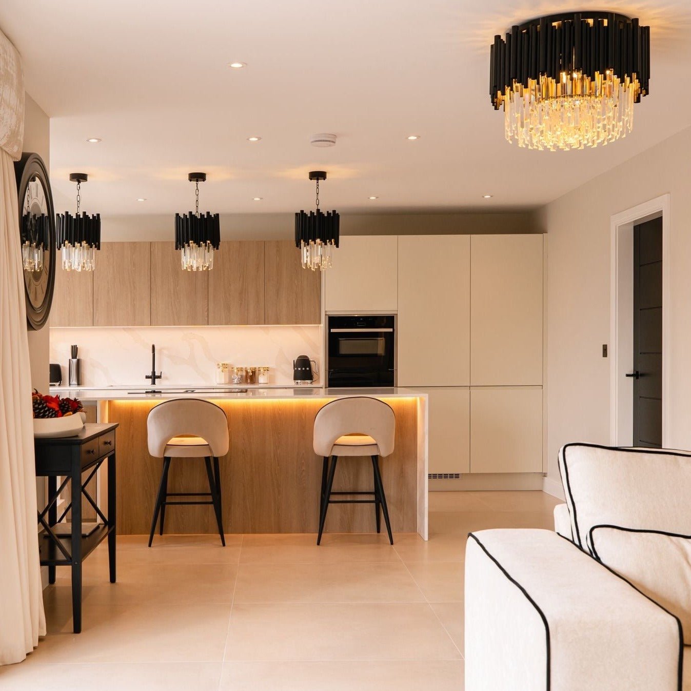VORELLI® Gotham ceiling light installed in a modern luxury living and kitchen space.