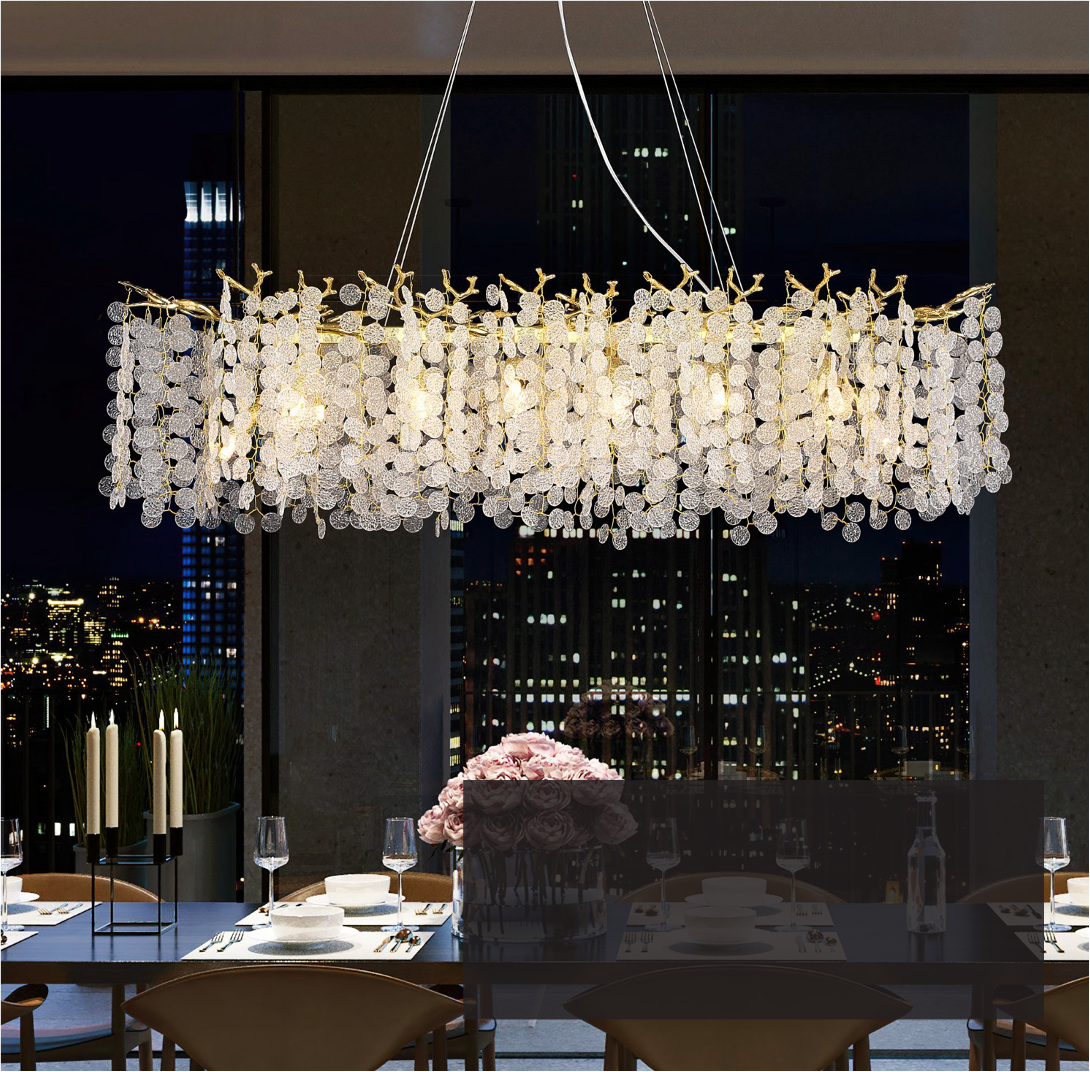 Luxury rectangular chandelier with cascading textured glass discs over dining table