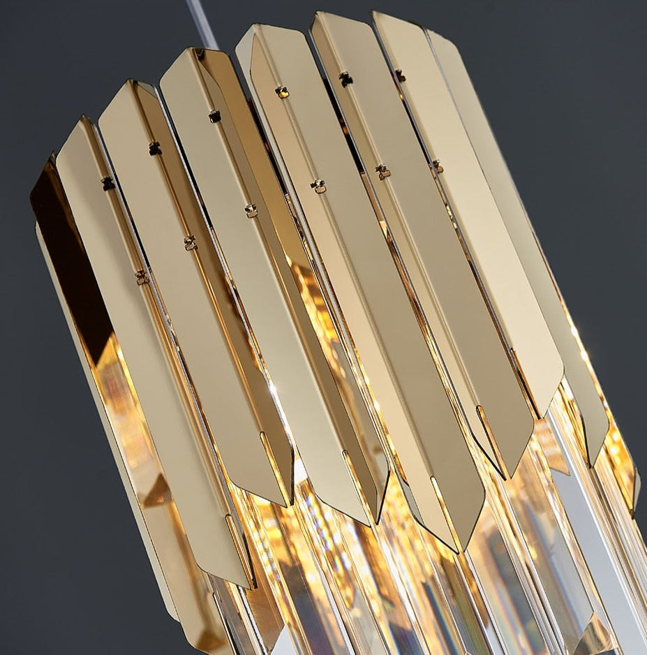 Close-up of VORELLI Manhattan Pendant Staircase Chandelier gold hexagon frame with layered crystal bars