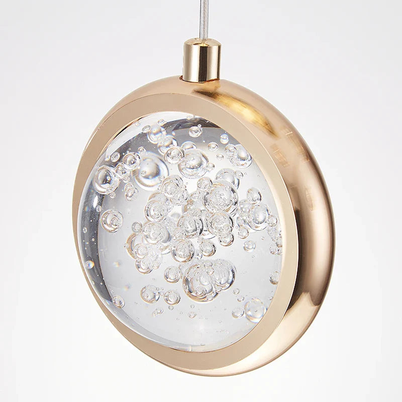Cluster pendant chandelier by VORELLI® showcasing warm glowing orbs suspended for statement stairwell and foyer lighting
