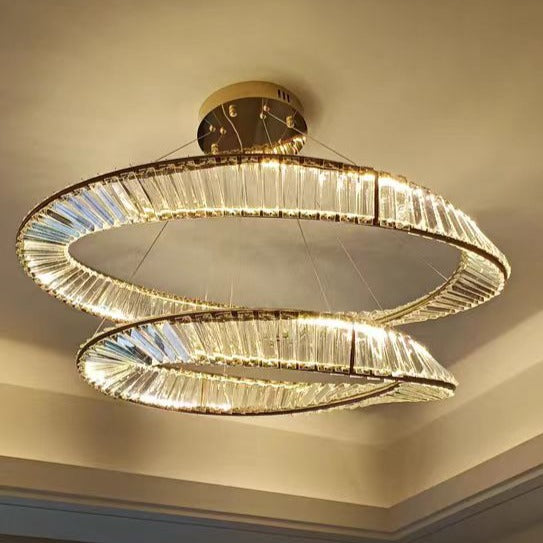Close ceiling view of dual illuminated crystal rings on the VORELLI Melia double circular chandelier