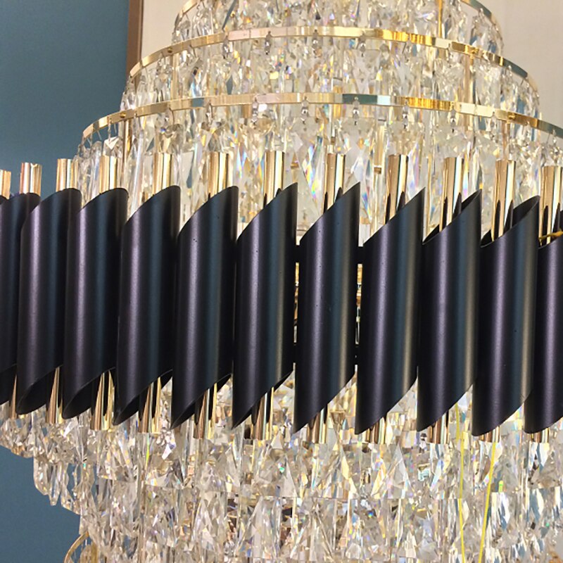 Full cascading view of the VORELLI Milltimber Grandeur Staircase Chandelier II in a grand double-height interior