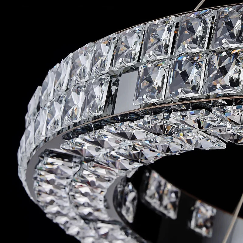 Close up of VORELLI® Minato double circular chandelier showing diamond cut crystal bars arranged along ring frame
