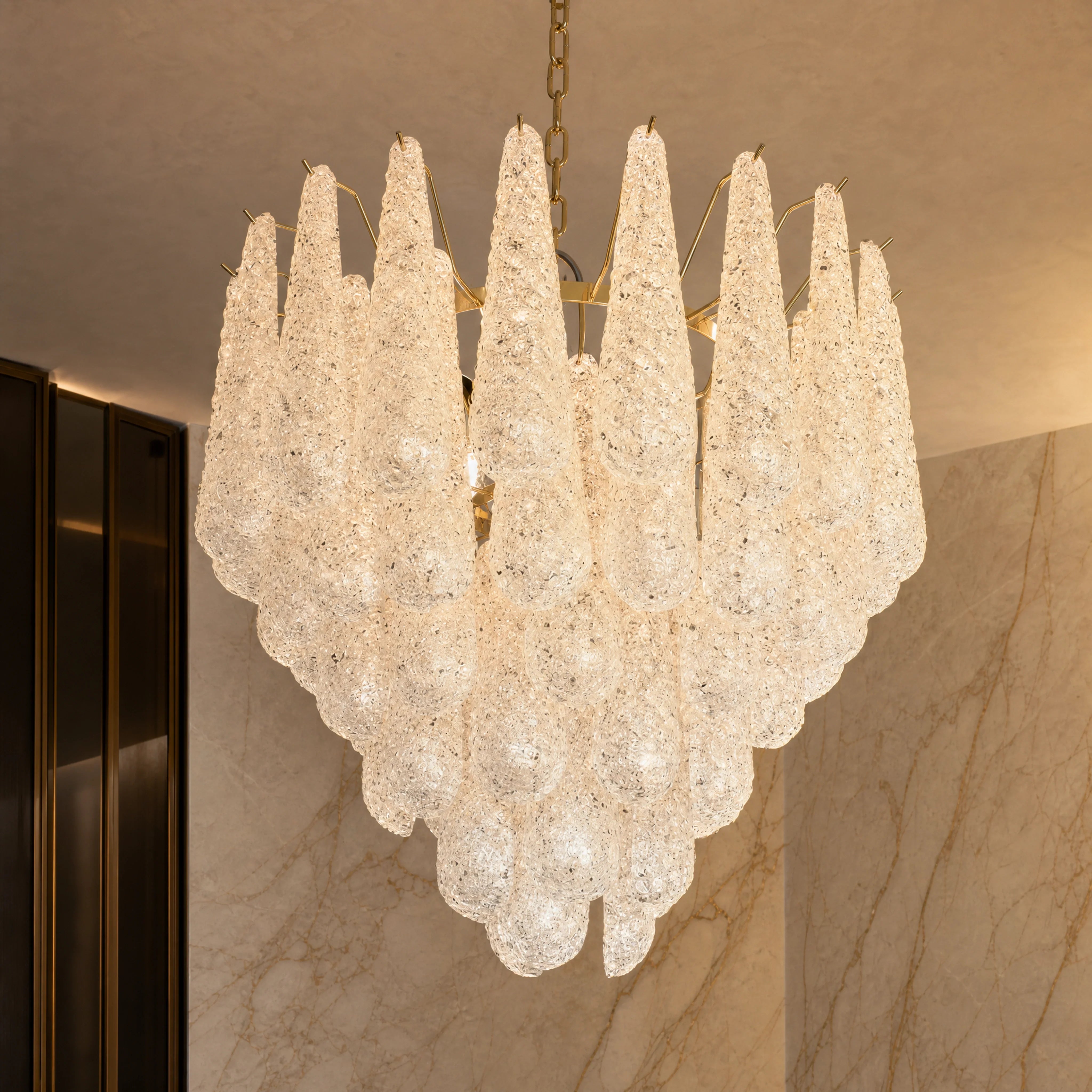 Nerissa Conchiglie Murano Shell Glass Staircase Chandelier close-up luxury lifestyle hero image by VORELLI