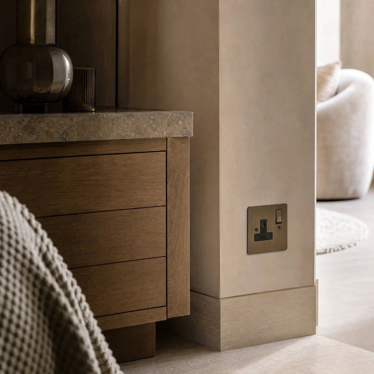 VORELLI® Ambassador Classic Single Socket, shown beside bedroom or living-room joinery in an interior visualisation.