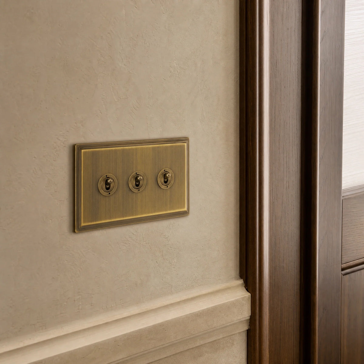 VORELLI® Belgravia Toggle Switch, close view on an interior wall in an interior visualisation.