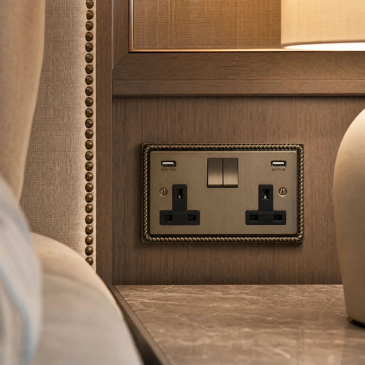 VORELLI® Georgian Double Socket + USB, close view beside bedroom or living-room joinery in an interior visualisation.