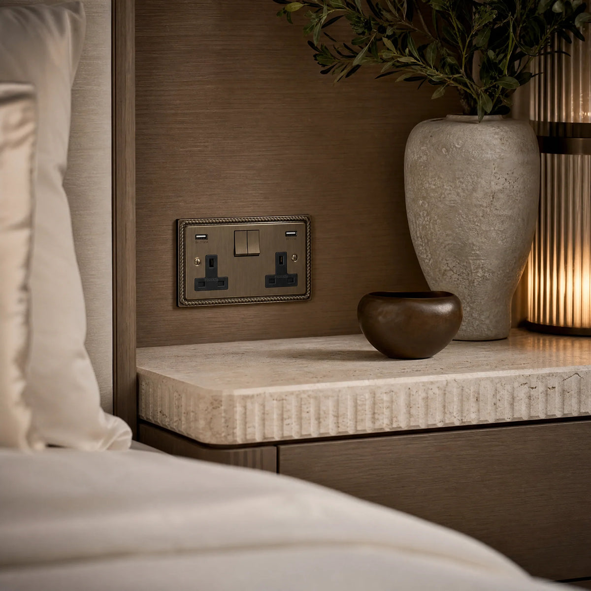 VORELLI® Georgian Double Socket + USB, shown beside bedroom or living-room joinery in an interior visualisation.