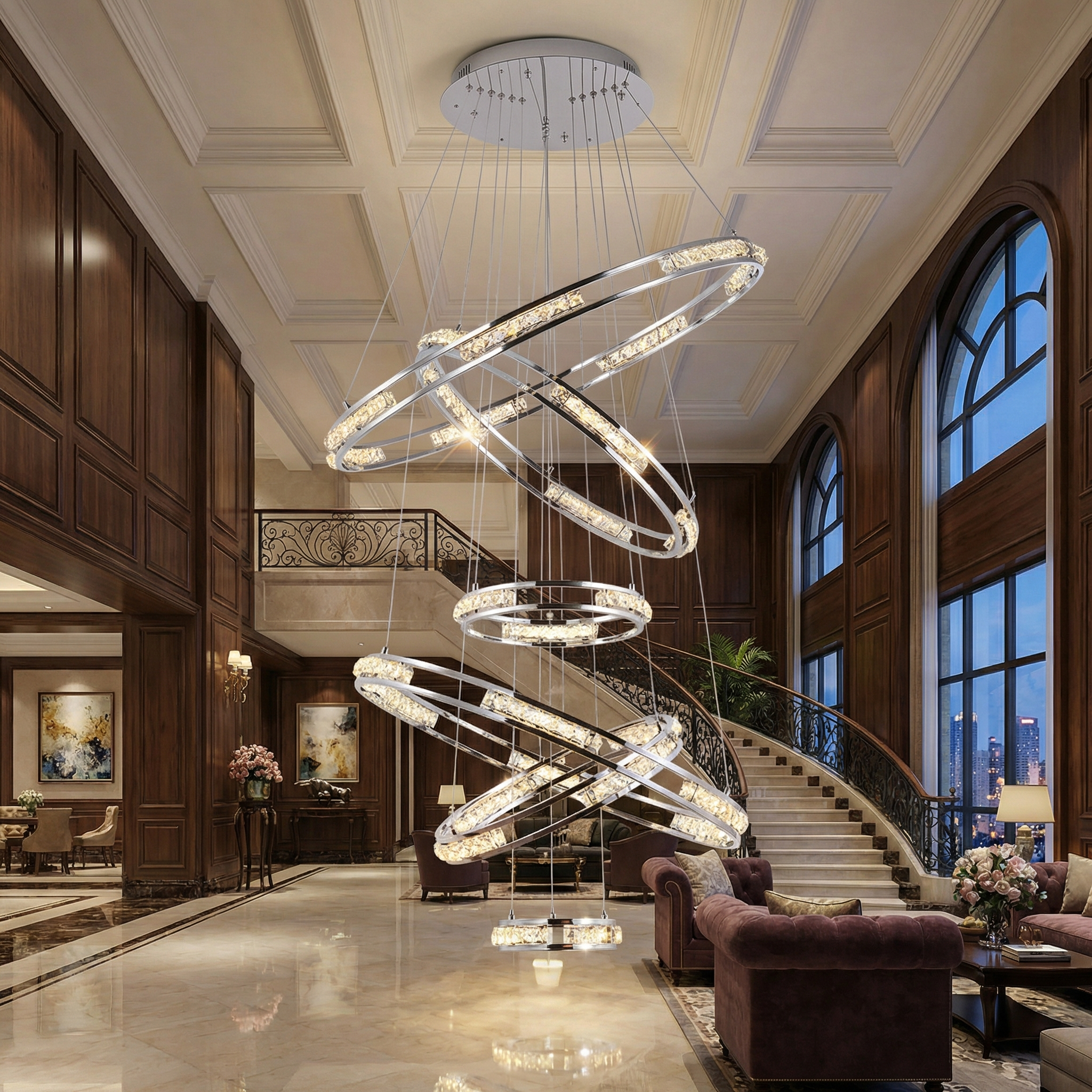 VORELLI Vermacelli ring staircase chandelier with cascading illuminated spiral rings in a luxury double-height interior