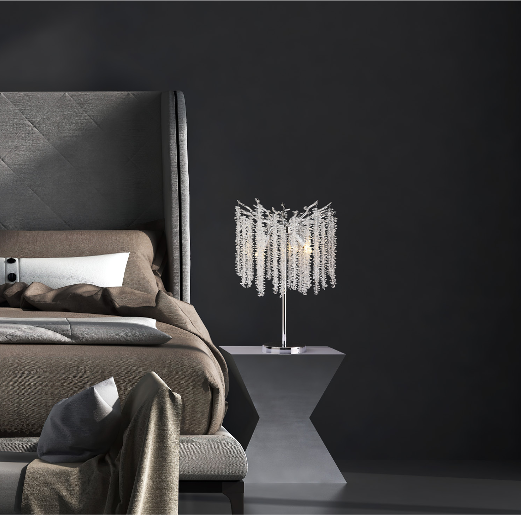 Luxury Wisteria table lamp styled beside a bed with cascading crystal strands in an elegant interior